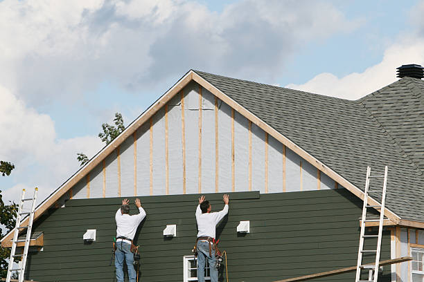 Professional Siding technician working in Terryville, CT